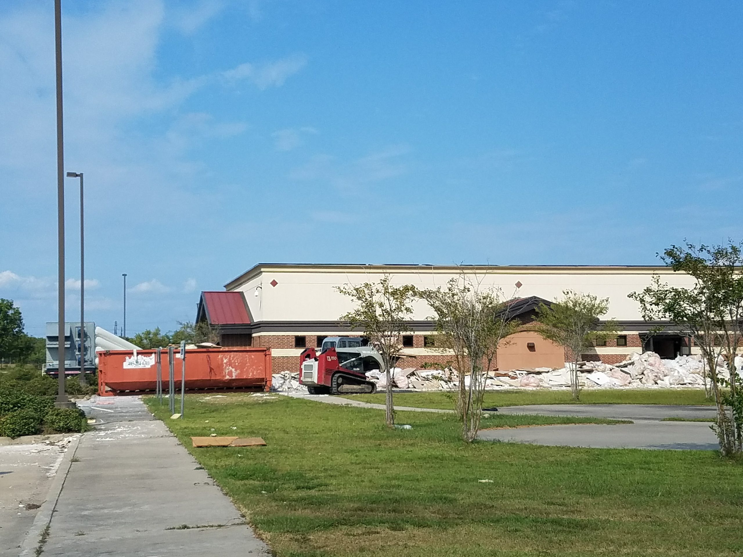 outside of Port Arthur School District with damage from flooding